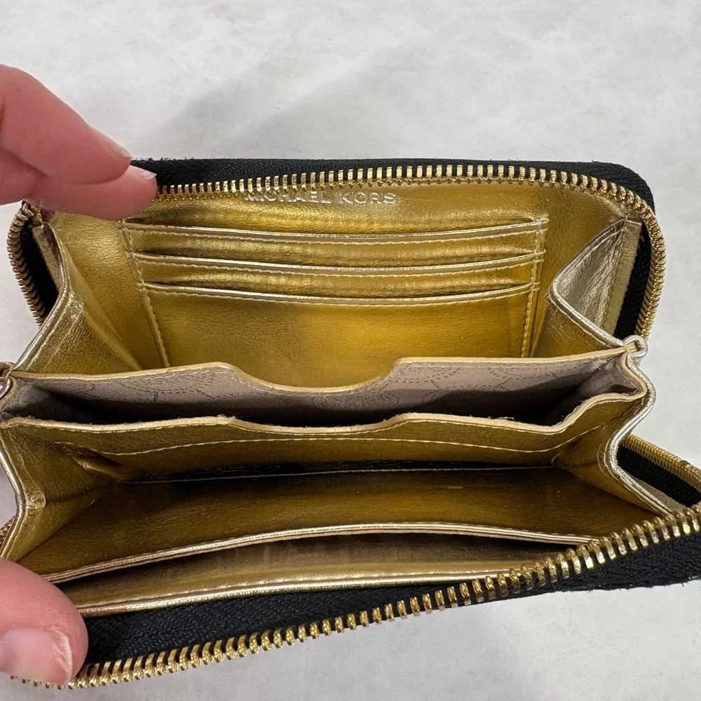Michael Kors Black Snake-Embossed Wristlet with Gold Plate